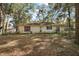 Backyard with mature trees and large lot at 5870 Se 158Th Ct, Ocklawaha, FL 32179