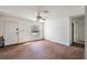 Bright living room with laminate floors and a view to the entrance at 5870 Se 158Th Ct, Ocklawaha, FL 32179