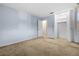 Bedroom with carpet, closet and access to hallway at 5938 Marlberry Dr, Orlando, FL 32819