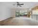 Spacious living room with access to a screened porch at 5938 Marlberry Dr, Orlando, FL 32819