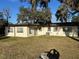 Ranch-style home with a large backyard at 609 Scenic St, Leesburg, FL 34748