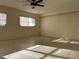 Living room with tile floors and block walls at 609 Scenic St, Leesburg, FL 34748