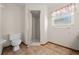 Bright bathroom features a shower and tile floors at 7 Ginger Cir, Leesburg, FL 34748