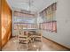 Charming dining room features tile floors, and a white round table with matching chairs at 7 Ginger Cir, Leesburg, FL 34748