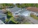 Charming single-Gathering home with a well-maintained lawn, attached garage, and inviting curb appeal at 7 Ginger Cir, Leesburg, FL 34748