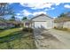 Single story house with gray siding and a one car garage at 7 Ginger Cir, Leesburg, FL 34748