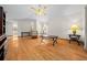 Bright living room featuring hardwood floors and ample natural light at 7 Ginger Cir, Leesburg, FL 34748