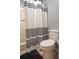 Bathroom with a toilet and shower/tub combo at 702 Skyridge Rd, Clermont, FL 34711