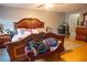 Main bedroom with king-size bed and plenty of storage at 702 Skyridge Rd, Clermont, FL 34711