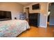 Bedroom with a double bed, dresser and a TV at 702 Skyridge Rd, Clermont, FL 34711