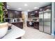 Updated kitchen featuring dark cabinetry and stainless steel appliances at 702 Skyridge Rd, Clermont, FL 34711