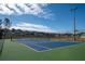 Enjoy a sunny day playing tennis in this well-maintained court at 702 Skyridge Rd, Clermont, FL 34711