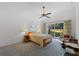 Main bedroom with sliding glass doors leading to backyard at 7023 Arcadian Ct, Mount Dora, FL 32757