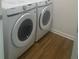 Bright laundry room with Samsung washer and dryer at 7268 Annison Ter, The Villages, FL 32163