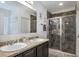 Bathroom boasts dual sinks and a large walk-in shower at 742 Franklin Ct, Haines City, FL 33844