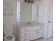 Clean bathroom with vanity, mirror and toilet at 7558 Sw 103Rd Loop, Ocala, FL 34476