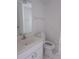 Clean bathroom with a toilet, sink, and vanity at 7558 Sw 103Rd Loop, Ocala, FL 34476