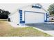 Attached garage with ample parking space at 7558 Sw 103Rd Loop, Ocala, FL 34476