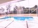 Screened-in pool with backyard view at 7558 Sw 103Rd Loop, Ocala, FL 34476