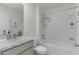 Bathroom with tub, shower, and a vanity with a countertop at 8661 Triumph Cir, Wildwood, FL 34785