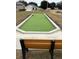 Bocce ball court with wooden bench at 8661 Triumph Cir, Wildwood, FL 34785