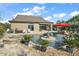 Expansive pool and spa with dolphin fountain and tropical plants at 9277 Sw 70Th Loop, Ocala, FL 34481