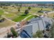 Aerial view of clubhouse near golf course at 9397 Se 124Th Pl, Summerfield, FL 34491