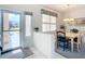 Bright dining area with table, chairs, and window coverings at 9397 Se 124Th Pl, Summerfield, FL 34491