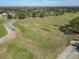 Aerial view of golf course driving range at 9397 Se 124Th Pl, Summerfield, FL 34491