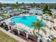 Resort-style pool with plenty of lounge chairs and a spa at 9397 Se 124Th Pl, Summerfield, FL 34491