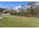 Large backyard with shed and wooded backdrop at 1 Malauka Pass Ct, Ocklawaha, FL 32179