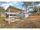 Backyard with shed and covered patio at 10830 Anna Belle Ave, Leesburg, FL 34788