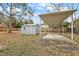 Backyard with shed and covered patio at 10830 Anna Belle Ave, Leesburg, FL 34788