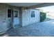 Covered carport featuring a brick support structure and paved parking space, offering protection at 1204 Maria Ct, Lady Lake, FL 32159