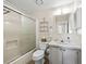 Clean bathroom with shower/tub combo, toilet and vanity at 1210 Tarpon Ln, The Villages, FL 32159