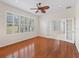 Bright den featuring hardwood floors, natural light, and French doors at 12886 Se 97Th Terrace Rd, Summerfield, FL 34491