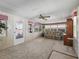 Sunroom with tiled floor, and a ceiling fan at 1303 E Schwartz Blvd, The Villages, FL 32159