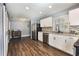 Modern kitchen featuring white cabinets and stainless steel appliances at 1333 Lakeview Dr, Clermont, FL 34711