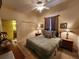 King-size bedroom with ensuite bathroom and ample closet space at 13415 Blue Heron Beach Dr # 1501, Orlando, FL 32821