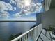 Enjoy breathtaking lake views from this balcony at 13415 Blue Heron Beach Dr # 1501, Orlando, FL 32821