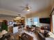 Spacious living area with kitchen, dining, and water views at 13415 Blue Heron Beach Dr # 1501, Orlando, FL 32821