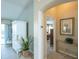 Inviting entryway showcasing an open floor plan leading to a bedroom and a bright living area at 1541 Fenimore Ln, The Villages, FL 32162