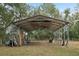 Large metal carport in backyard at 15831 Se 89Th Ter, Summerfield, FL 34491