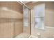 Clean shower with sliding glass door at 15831 Se 89Th Ter, Summerfield, FL 34491