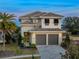 Two-story house with two-car garage at 16254 Ravenna Ct, Bella Collina, FL 34756