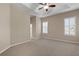 Spacious bedroom with neutral walls and carpeted floors at 16904 Se 110Th Court Rd, Summerfield, FL 34491