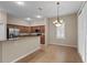 Bright dining room with chandelier and tile flooring at 16904 Se 110Th Court Rd, Summerfield, FL 34491