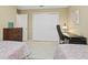 Spacious bedroom with twin beds and ample closet space at 16958 Se 94Th Sunnybrook Cir, The Villages, FL 32162