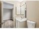 Clean bathroom with white vanity, and a toilet at 17461 Se 93Rd Retford Ter, The Villages, FL 32162