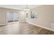 Dining area with vinyl flooring and access to the sunroom at 17461 Se 93Rd Retford Ter, The Villages, FL 32162